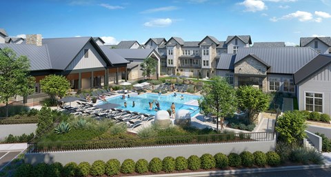 an aerial view of a resort style pool with lounge chairs and umbrellas